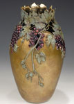In Vino Veritas I, a bronze vessel by carol alleman celebrating wine and grapes