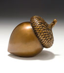 Possibilities, a bronz sculpture by Carol Alleman of an acrorn that one can comfortably hold in her hand