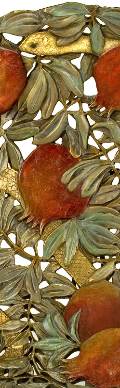 Seeds of Harmony, a bronze bowl by Carol Alleman, detail of snake head with pomegranate and leaves