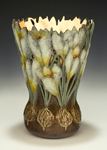 Snowy White Promises, a bronze vessel by Carol Alleman inspired by the crocus
