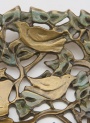 Sacred Marriage, a bronze bowl by Carol Alleman. Detail of 2 birds.